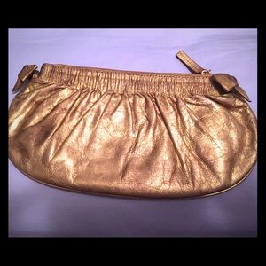 Vintage Gold Leather clutch with bow accents !