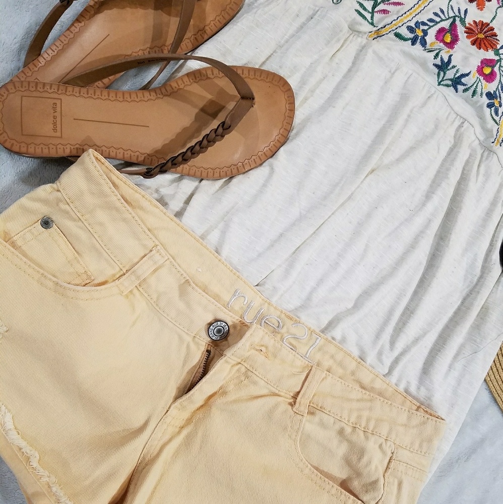 Light orange/peach colored jean shorts