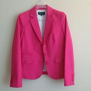 Hot pink blazer with polka dot lining