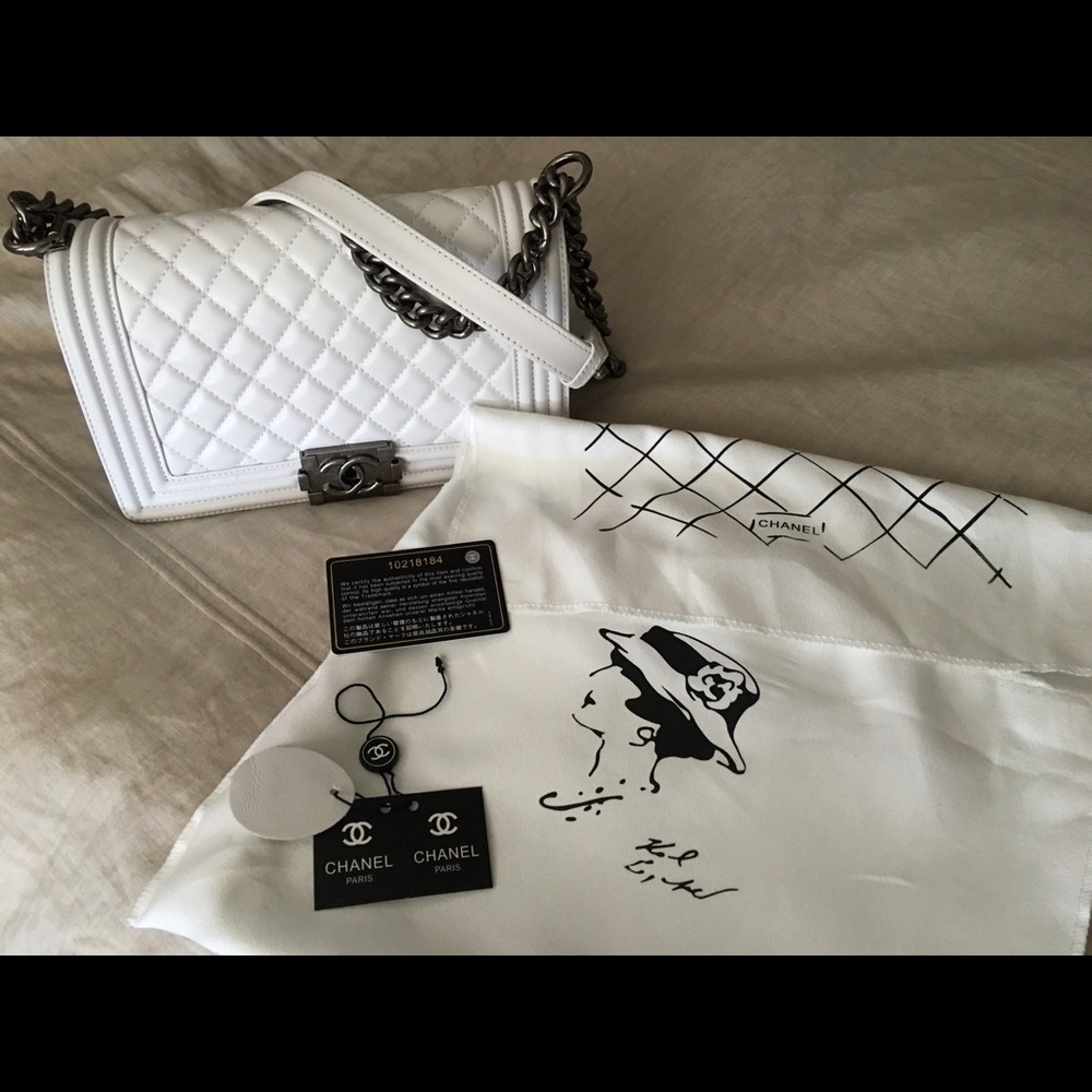 The real deal! White Chanel boy purse!