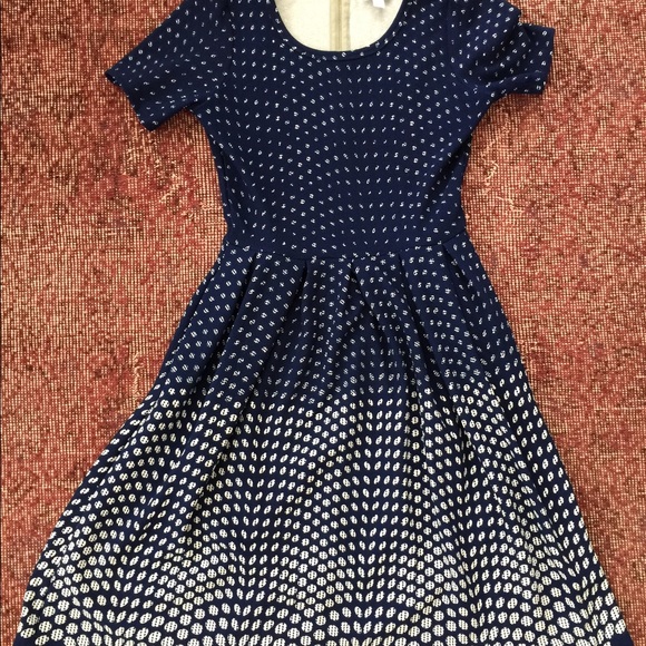 LuLaRoe Dresses & Skirts - Navy polka dot Lularoe Amelia. Size M. Worn once.
