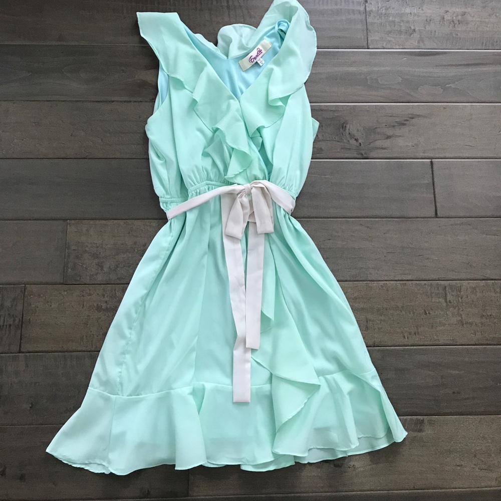 Mint green dress with cream sash