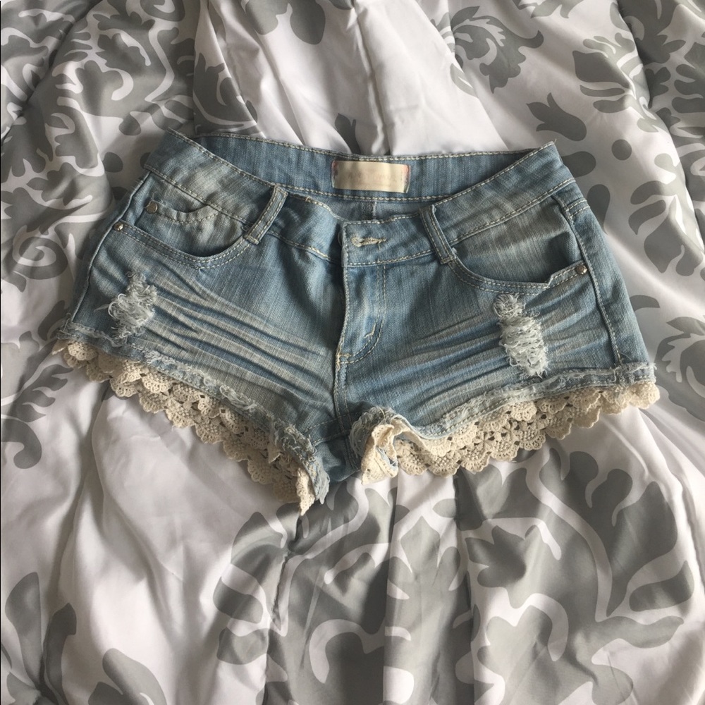Light blue distressed short shorts