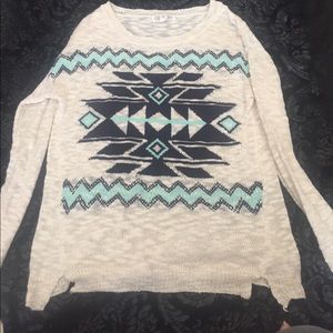 Cream and teal colored knit sweater