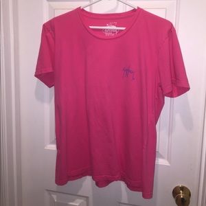 Woman's Guy Harvey shirt.