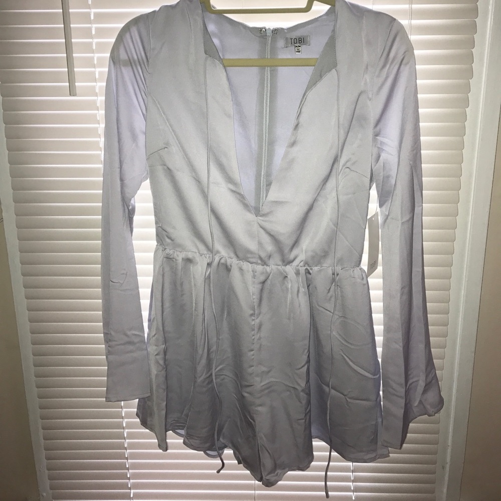 Brand new baby blue Tobi romper