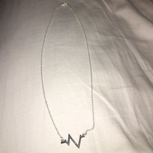 Silver heart beat necklace