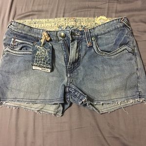 Stitch's denim shorts