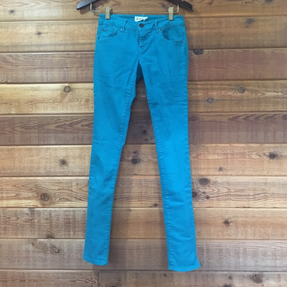 Teal skinny jeans