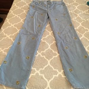 Boot cut Scottie embroidered corduroy pants.