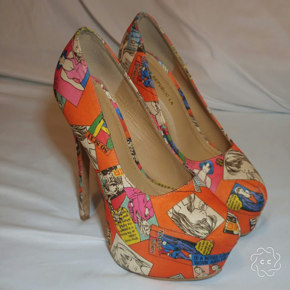 Orange comic book style platform heels.