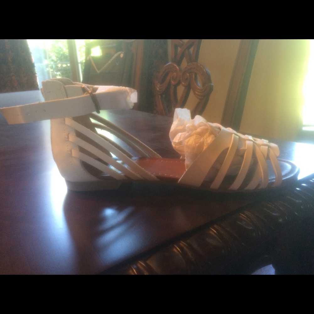Size 7 white sandals.