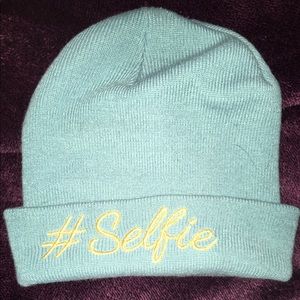 blue hat with gold "#selfie"