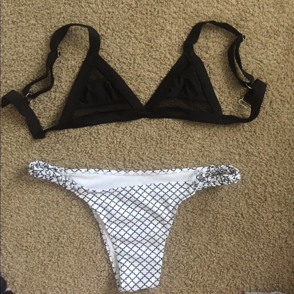 Black mesh bikini top and white patterned bottoms