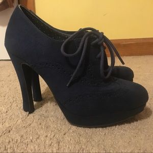 Deep blue lace up heels.