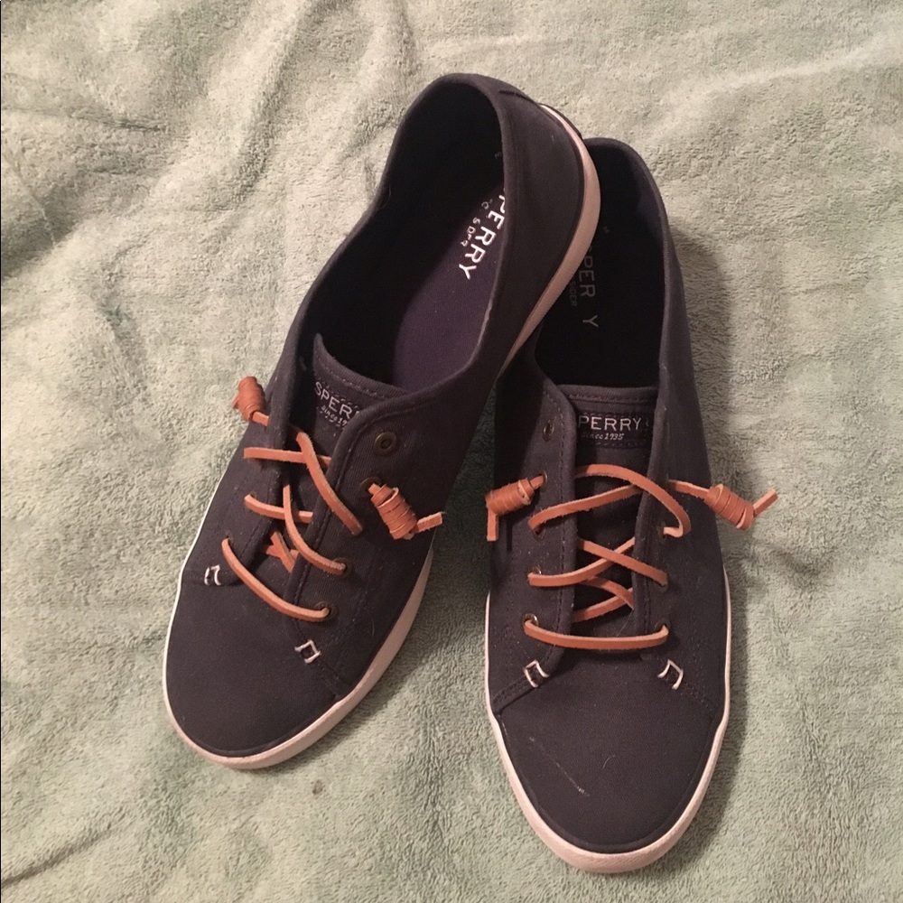 Navy sperry slip on shoes with brown laces