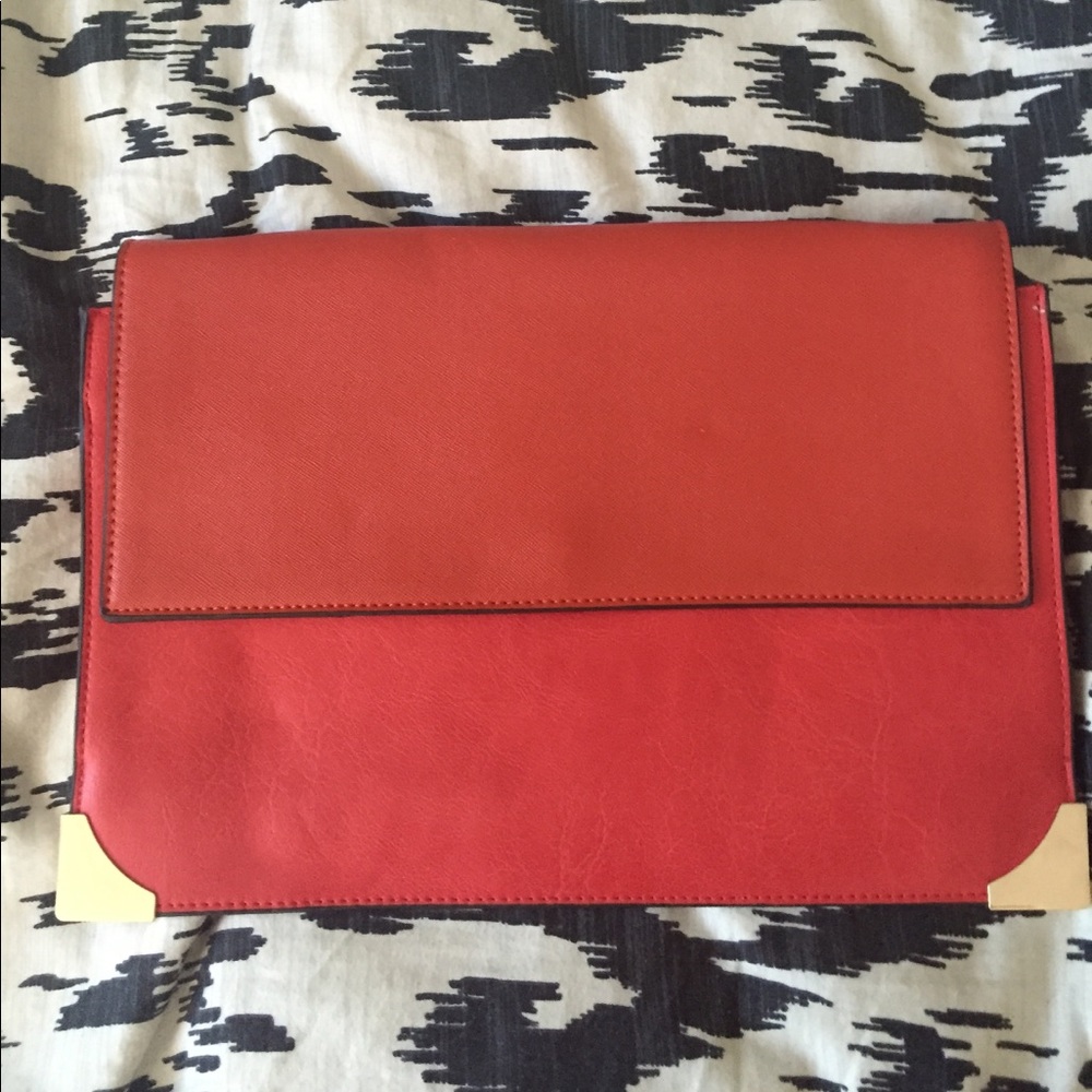 Reddish orange envelope bag w/ gold chain