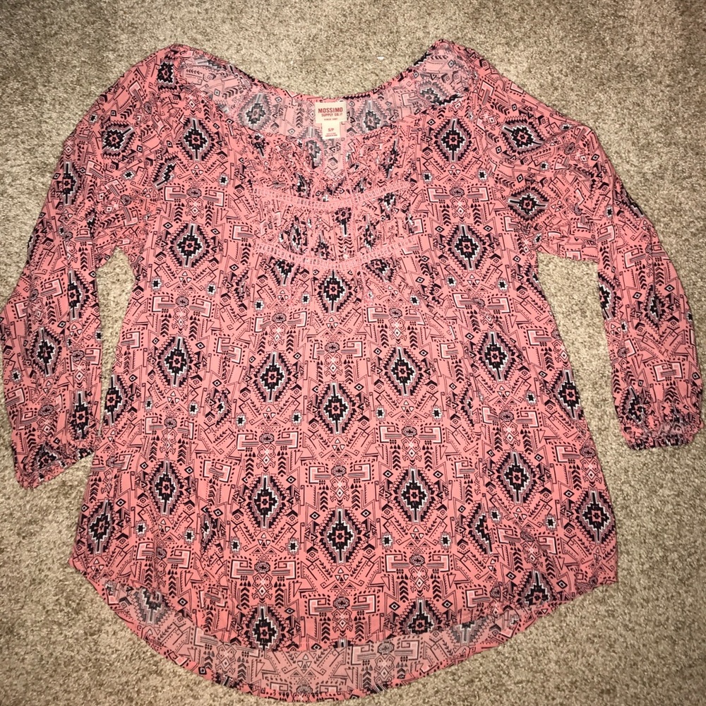 Pink top with Aztec print.