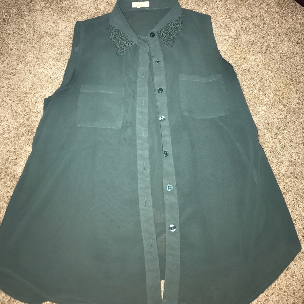 Teal sheer top with detailing on the collar.