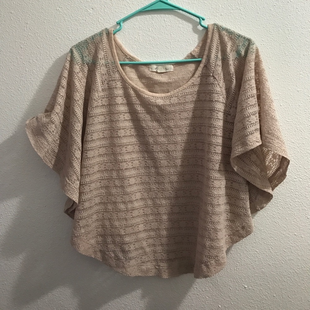 Sheer tan top with bohemian flow
