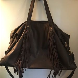 Black fringe weekender bag