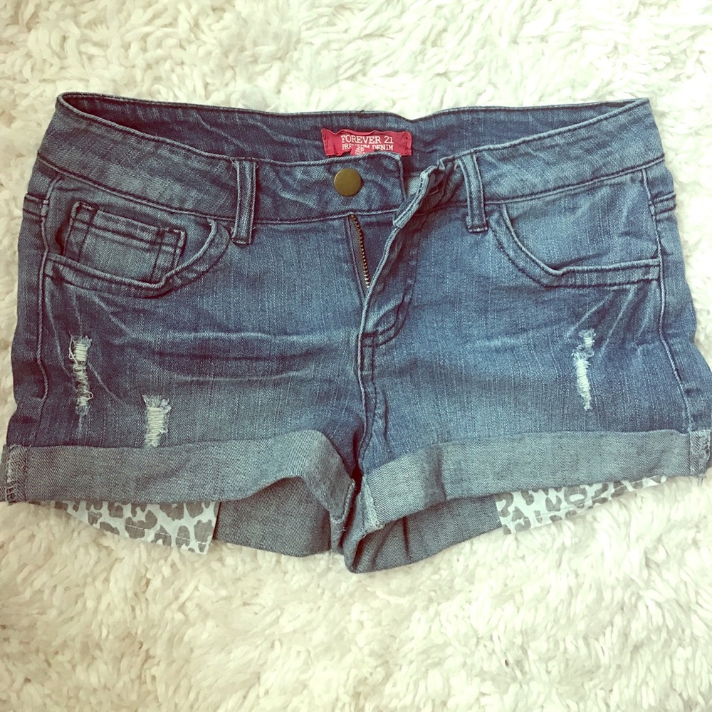Distressed denim shorts