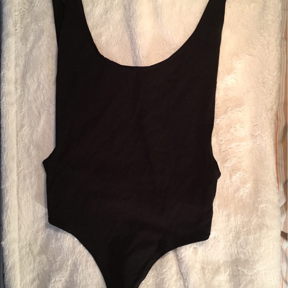 Black deep plunge bodysuit.