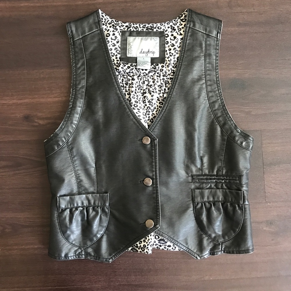 Women's leather vest with cheetah lining.