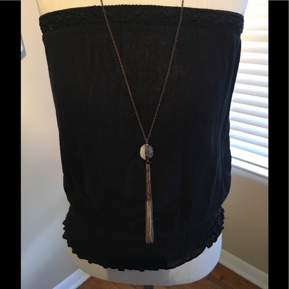 Black tunic with gathered waist. Size med