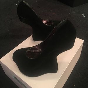 Black heel less shoes