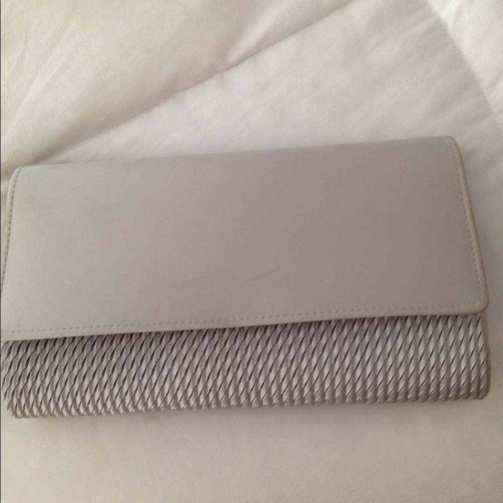 Very pretty silver clutch bag