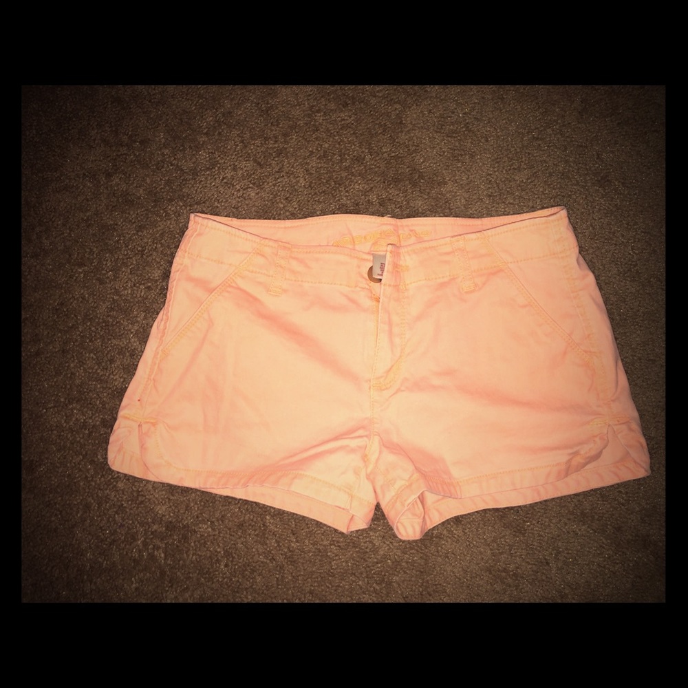 Size five, light neon orange shorts