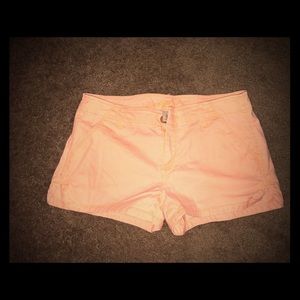 Size five, light neon orange shorts