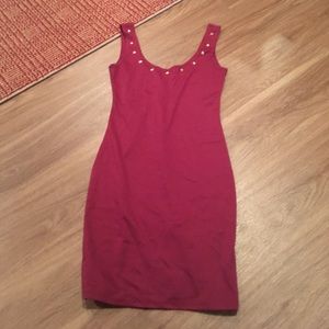 Maroon dress with gold gems at the top