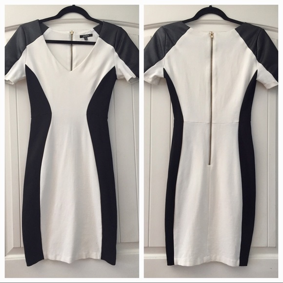 XOXO Dresses & Skirts - XOXO Bodycon dress faux leather sleeve