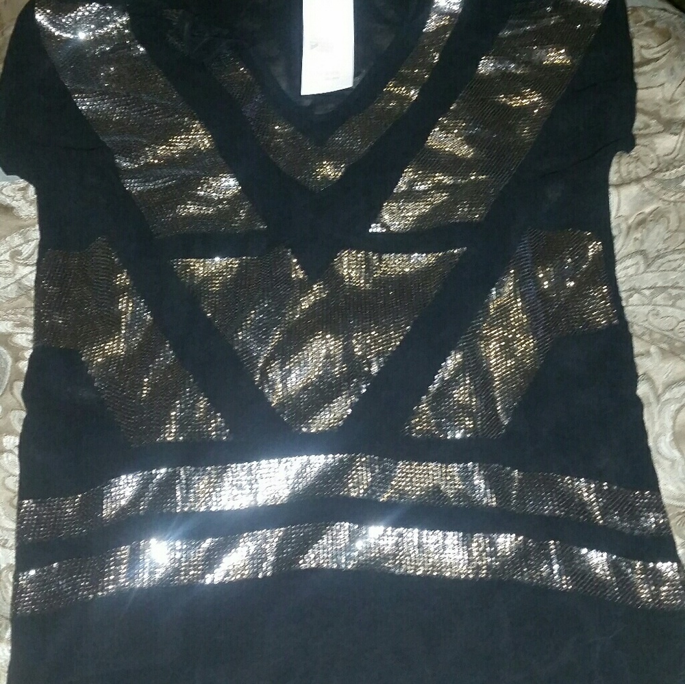 Black shirt with silver sequined design
