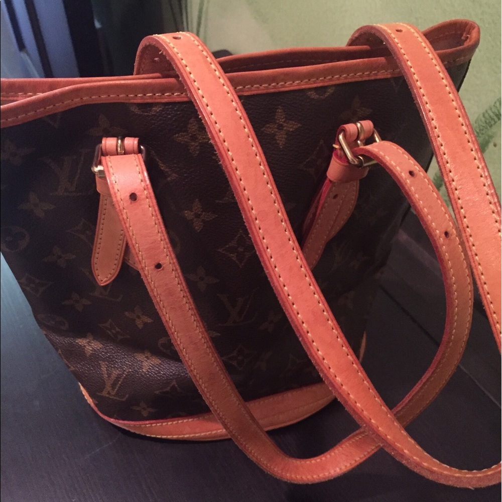 Louis Vuitton shoulder bag with wallet