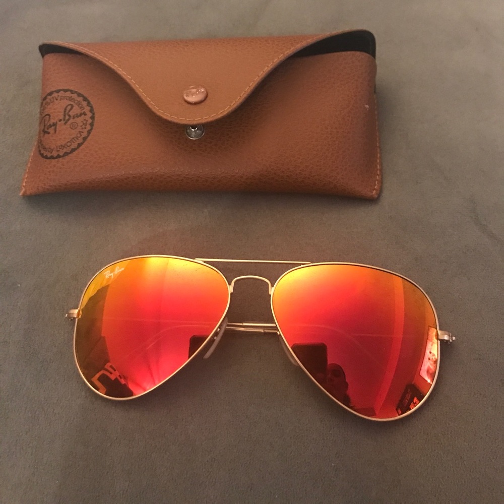Mirrored orange Aviator sunglasses.