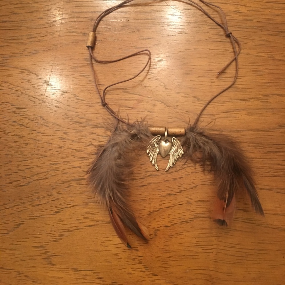 Handmade feathers leather bead medallion choker.