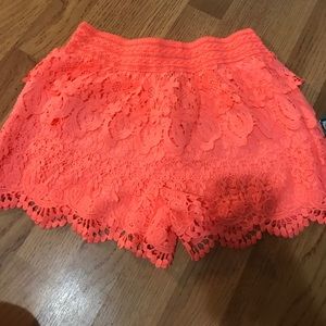 Neon pink/coral lace shorts