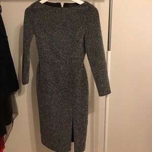 Long-sleeve grey and black midi dress.