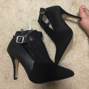 Black heeled booties from Spain