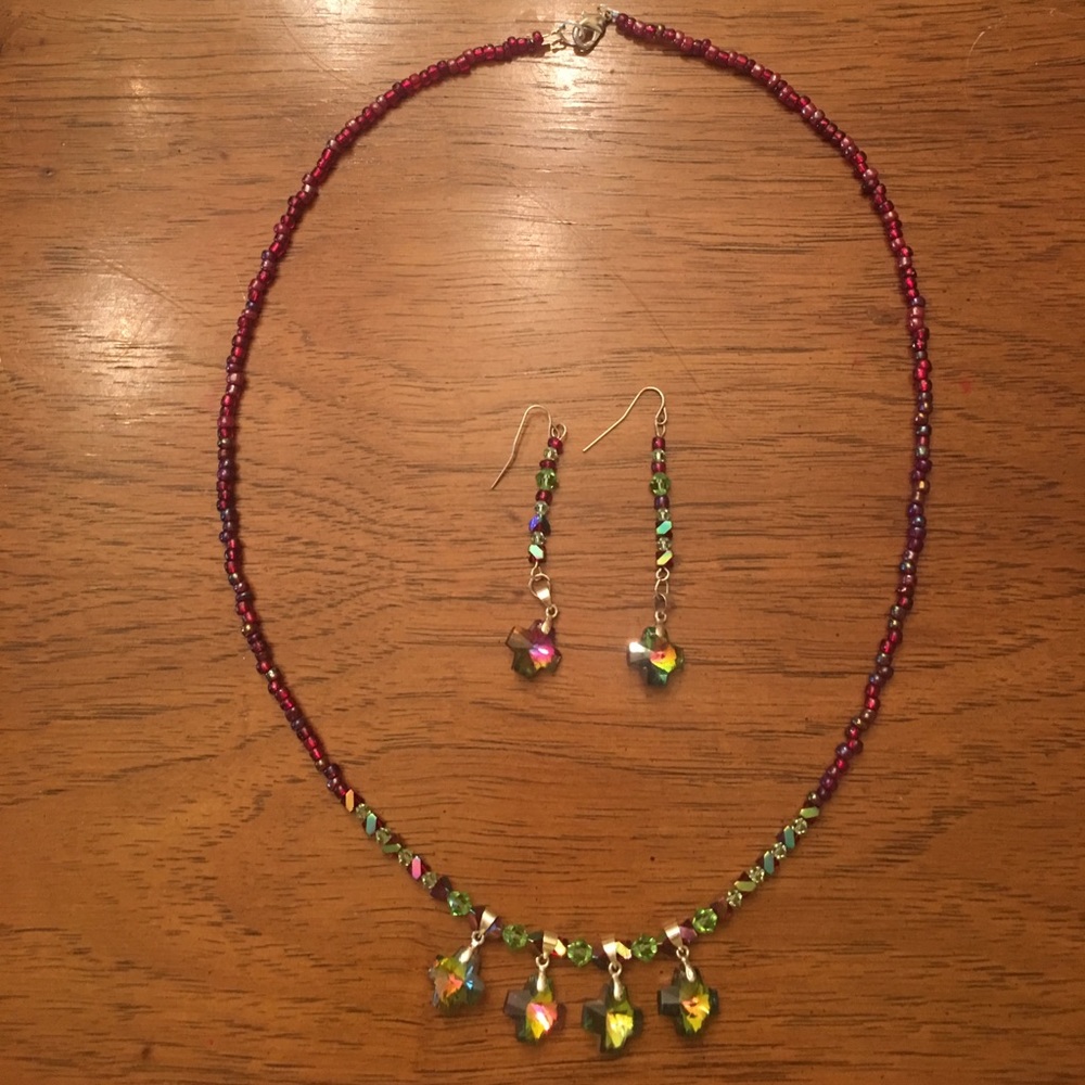Handmade beaded necklace and matching earrings.