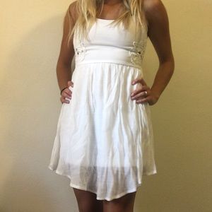 Flowy white dress with lace detail