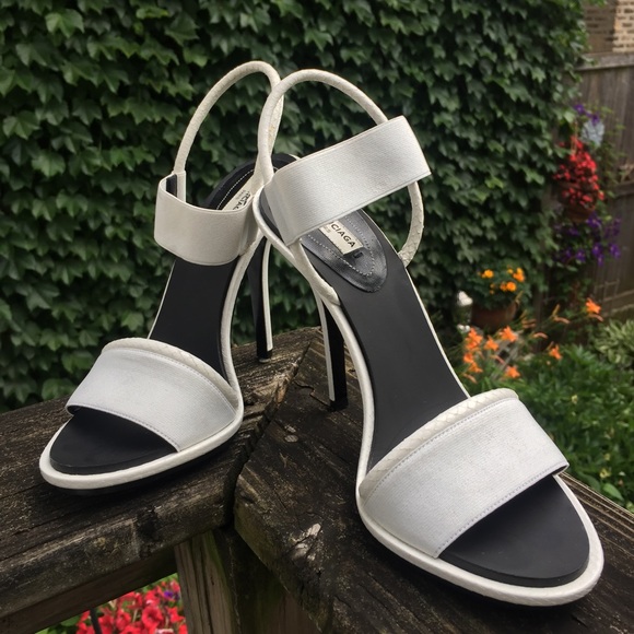 white elastic sandals