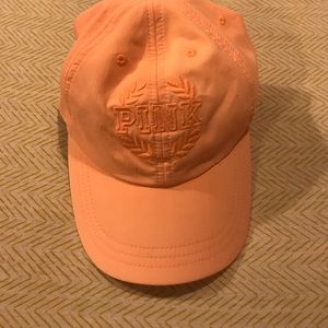 VS pink peach colored baseball cap