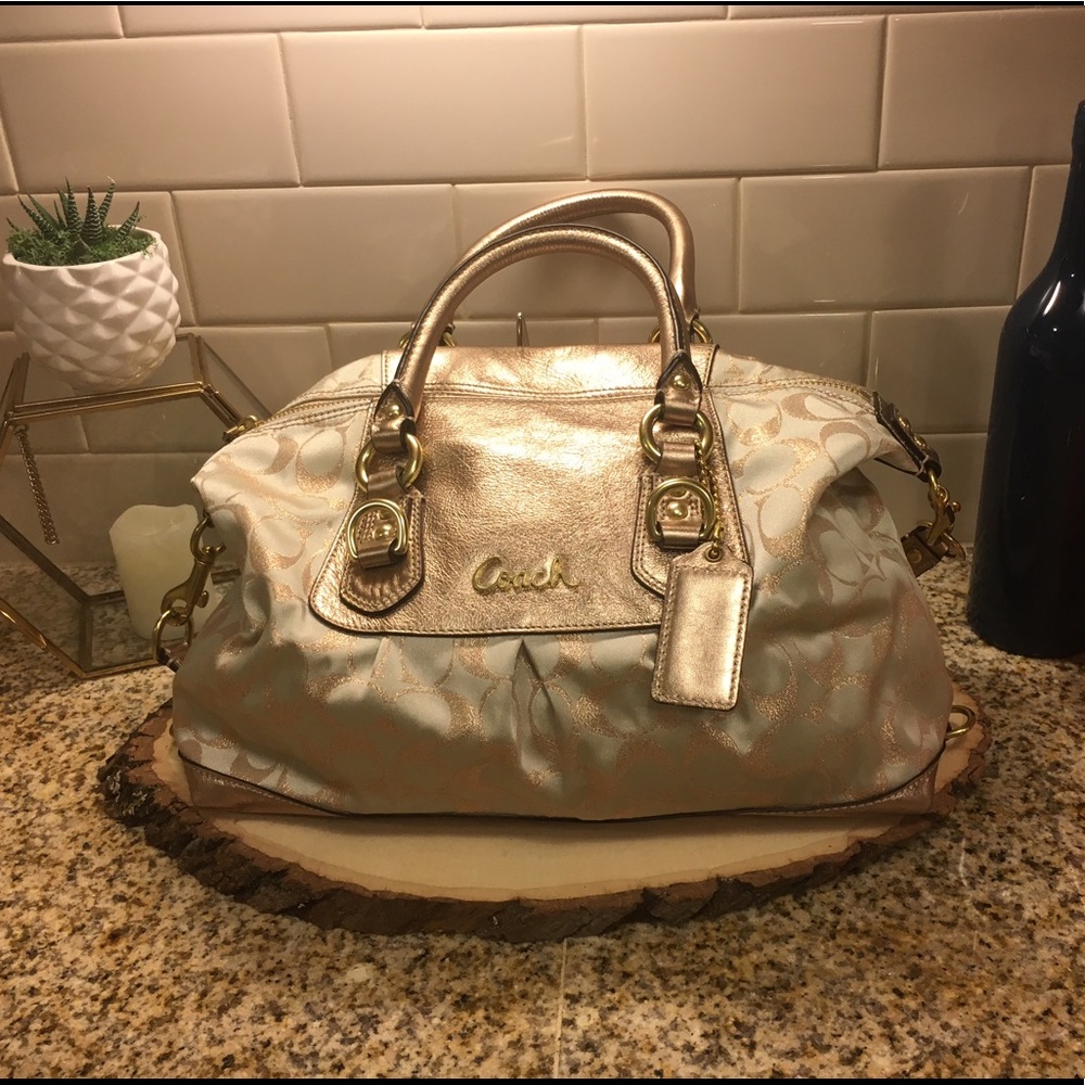 COACH: beautiful metallic gold purse with strap