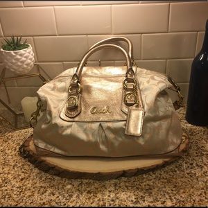 COACH: beautiful metallic gold purse with strap