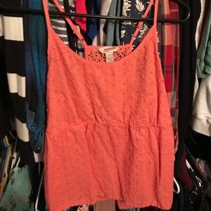 ARIZONA. Peach colored tank.