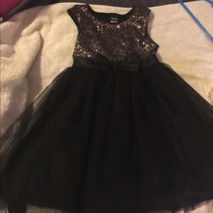 Black and gold holiday party dress